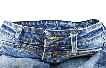 Blue denim jeans isolated on white backgroundの写真素材