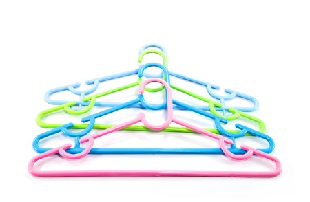 Colorful hangers isolated on white background の写真素材