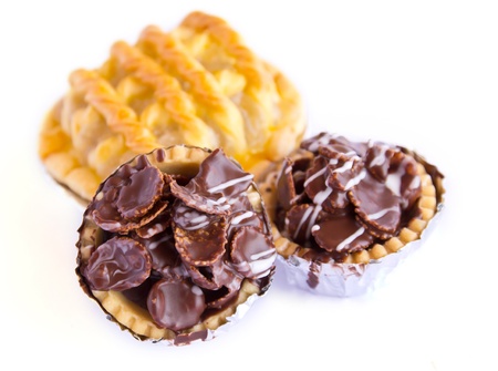 Set of tasty tartlets with chocolate isolated on white backgroundの写真素材