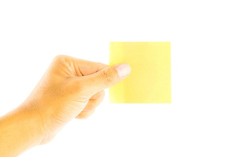 Hand holding blank business card isolated on white backgroundの写真素材