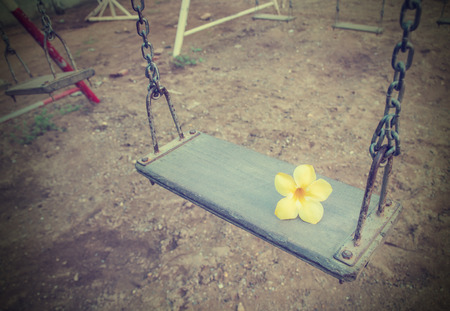 Retro style empty chain swing.の写真素材