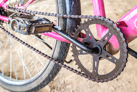 Close up old mountain bike crankset with chainの写真素材