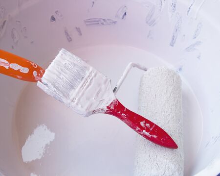 Close up paint brush and white paintの写真素材