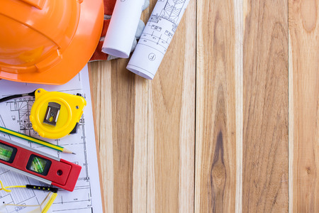 Architecture plan and rolls of blueprints with tool kit for the project engineer jobsの写真素材