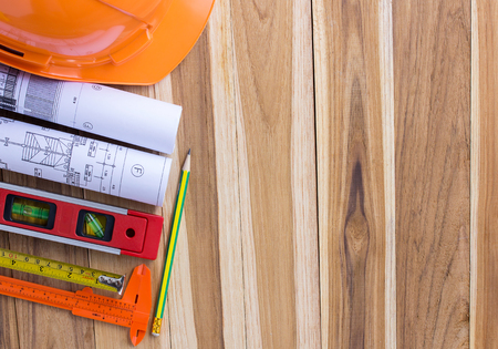 Architecture plan and rolls of blueprints with tool kit for the project engineer jobsの写真素材