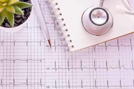Blue stethoscope and cardiogram pulse trace concept for cardiovascular medical exam. Medical and health concept.の写真素材