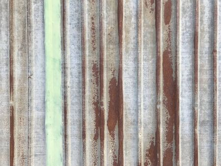 Abstract corroded colorful rusty metal background, rusty metal texture space for design and use.の写真素材