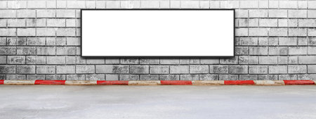 Blank advertising billboard on a brick wall. Horizontal design on black and white brick wall texture.の写真素材