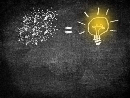 Hand drawing chalk bulb on blackboard. Creativity idea and inspiration concept.
