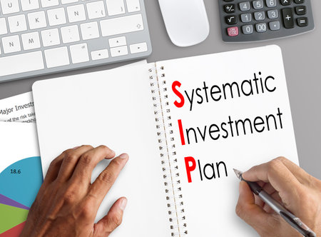 Systematic investment plan SIP is shown on the conceptual business. words typography top view...