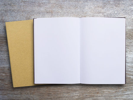Top view blank open book mock up on wood table background, catalog, magazines, brochure, note...