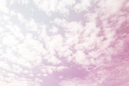 White clouds in the blue sky for any designの写真素材