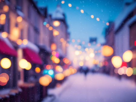 Blurred street of festive night or evening city with snowfall and Christmas lights. Blur Abstract christmas backgroundの素材