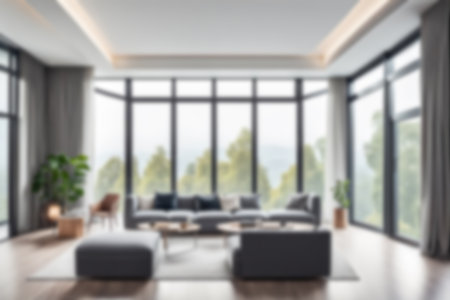 Blur image of living room with furniture at home with morning sunlight for background usage. blur interior background concept.の素材
