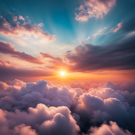 Sky,clouds background and texture. Dramatic amazing sky and clouds from above at sunset. Abstract pastel sky, coluds concept.の素材