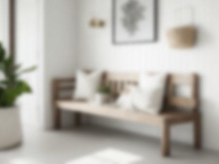 Blur living room at home with morning sunlight at big window for background usage. blur interior background concept.britht tone.の素材