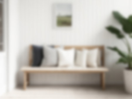 Blur living room at home with morning sunlight at big window for background usage. blur interior background concept.britht tone.の素材