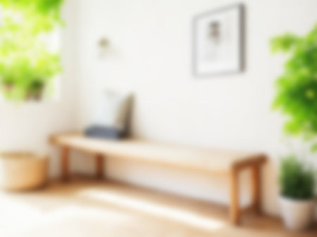 Blur living room at home with morning sunlight at big window for background usage. blur interior background concept.britht tone.の素材