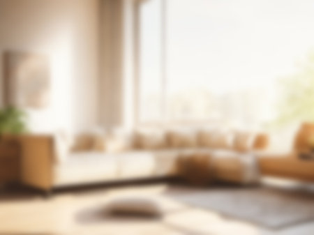 Blur living room at home with morning sunlight at big window for background usage. blur interior background concept.britht tone.の素材