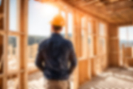 Blur images of workers in construction site. Silhouette Engineer and construction team working at site.の素材