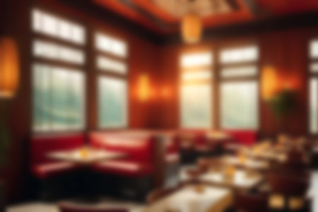 Blurred image of restaurant with light and bokeh for background usage. Blur interior backgroundの素材