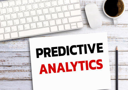 Business quotes, PREDICTIVE ANALYTICS on notebook or paper in office desk, office workplace, inspiration, motivation quotes concept.の写真素材