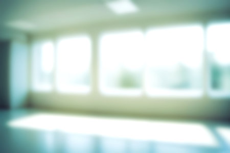 Blur clinic or hospital room, Light blurred background for use. blank hall an office or medical institution hall room. Blur interior background concept.の写真素材