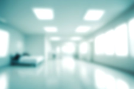 Blur clinic or hospital room, Light blurred background for use. blank hall an office or medical institution hall room. Blur interior background concept.の写真素材