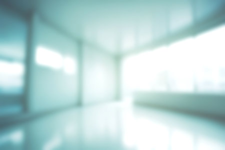 Blur clinic or hospital room, Light blurred background for use. blank hall an office or medical institution hall room. Blur interior background concept.の写真素材