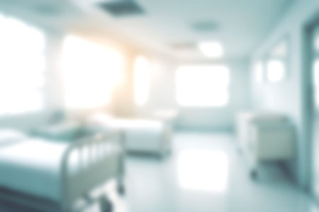 Blur clinic or hospital room, Light blurred background for use. blank hall an office or medical institution hall room. Blur interior background concept.の写真素材