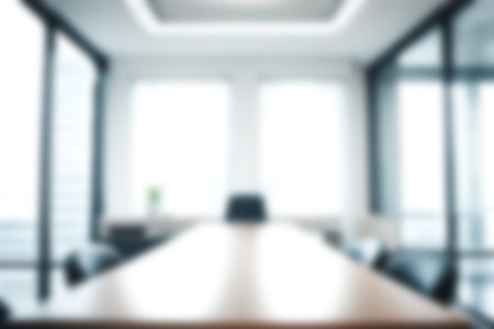Abstract blurred image of modern office with soft light for background usage. Blur interior background desing concept.の素材