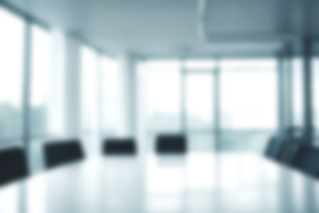 Abstract blurred image of modern office with soft light for background usage. Blur interior background desing concept.の素材