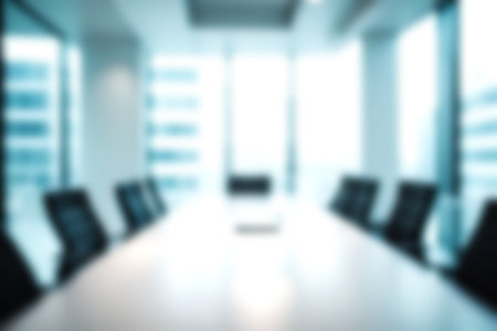 Abstract blurred image of modern office with soft light for background usage. Blur interior background desing concept.の素材