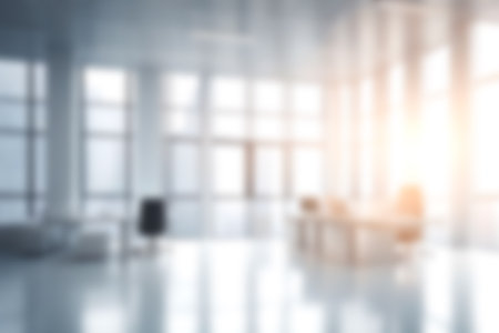 Abstract blurred image of modern office with soft light for background usage. Blur interior background desing concept.の素材