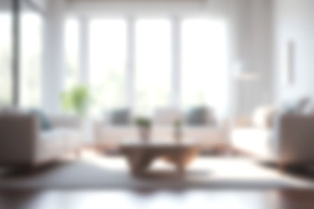 Blur living room at home with morning sunlight at big window for background usage. blur interior background concept. white, britht tone.の素材