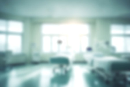 Blur clinic or hospital room, Light blurred background for use. blank hall an office or medical institution hall room. Blur interior background concept for use.の写真素材