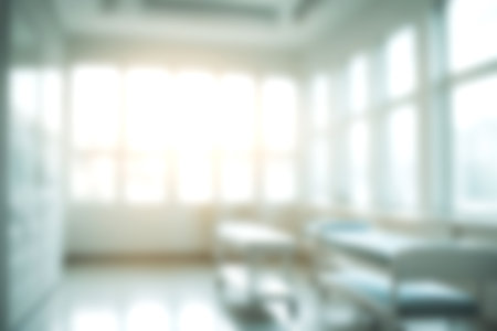 Blur clinic or hospital room, Light blurred background for use. blank hall an office or medical institution hall room. Blur interior background concept for use.の写真素材