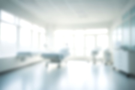 Blur clinic or hospital room, Light blurred background for use. blank hall an office or medical institution hall room. Blur interior background concept for use.の写真素材