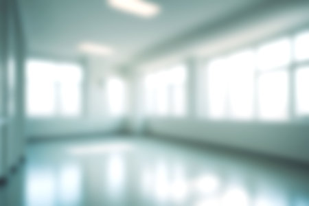 Blur clinic or hospital room, Light blurred background for use. blank hall an office or medical institution hall room. Blur interior background concept for use.の写真素材