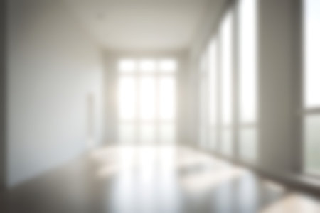 Abstract blurred image of blank hall room with soft light for background usage. Blur interior...