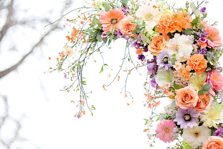 Colorful artificial flowers on white background with copy space for text.の素材