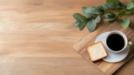 Cup of coffee with toast bread and eucalyptus branch on wooden background
