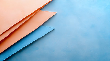 Colorful paper on blue background with copy space for text or image