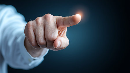 Close up of businesswoman hand touching screen with finger on dark background