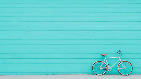 Bicycle on the background of a turquoise wooden wall.の写真素材