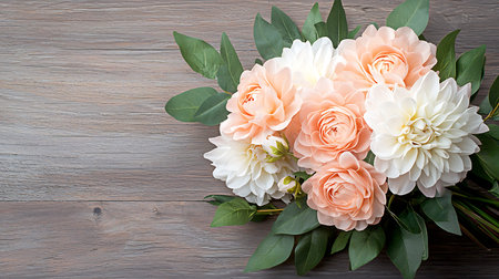 Bouquet of pink and white flowers on a wooden background.の写真素材