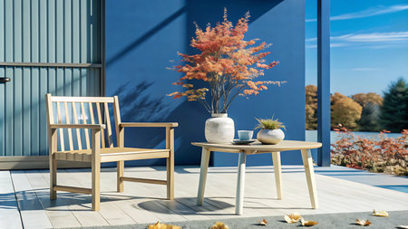 Wooden chairs and table with autumn leaves on terrace. 3d renderingの写真素材