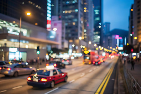 Blurred bokeh of car in city at night, abstract backgroundの写真素材