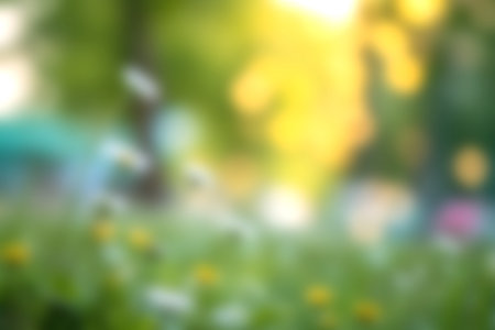 A serene soft focus image of colorful flowers set against a warm afternoon light. The bokeh effect adds depth, capturing the joy of nature. Perfect for evoking tranquility.の写真素材