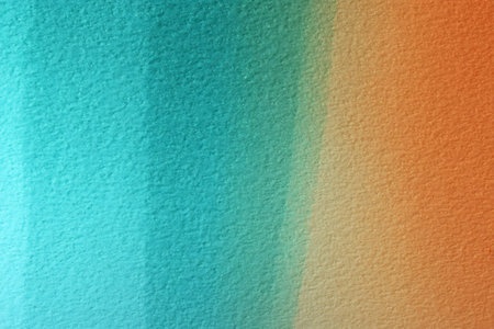 This image features a subtle gradient texture blending aqua and warm orange tones. The smooth...